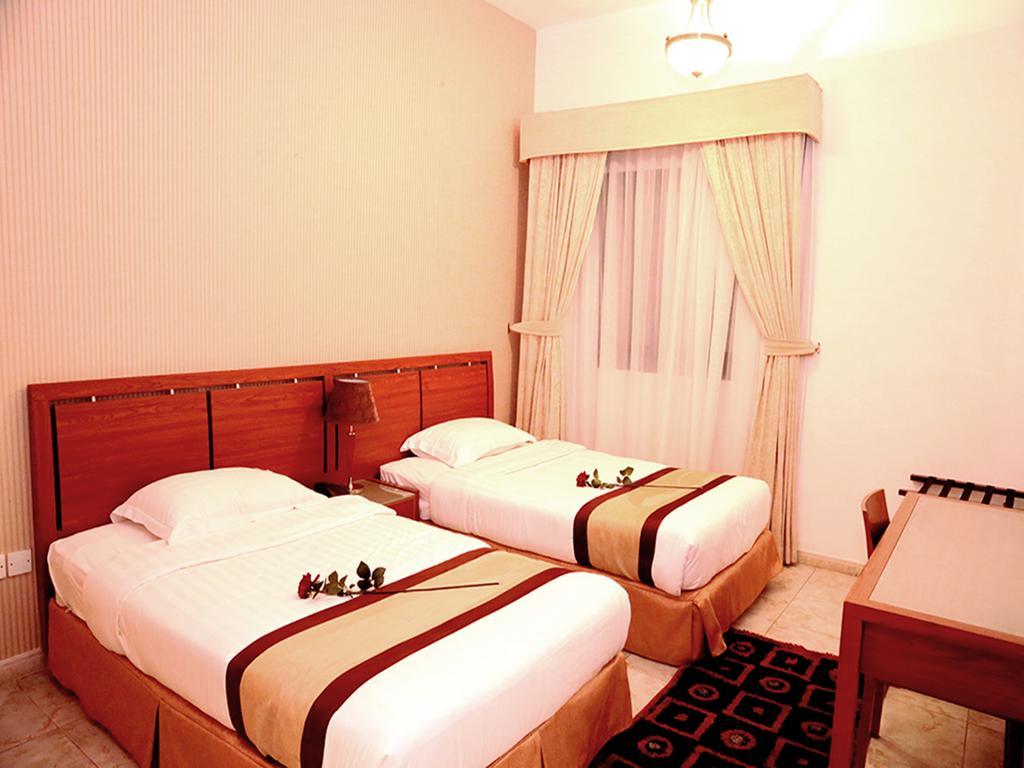 Arcadia Hotel Suites Sharjah Room photo
